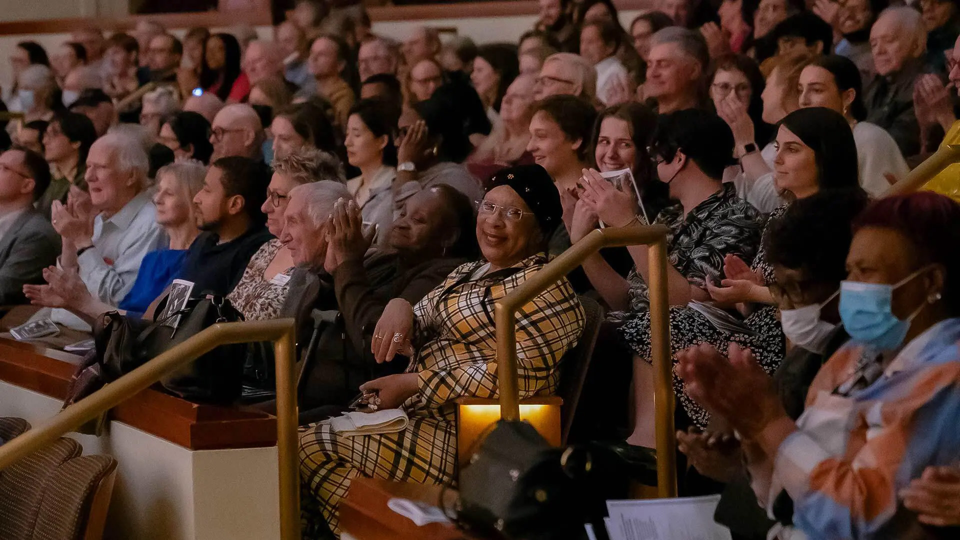 Iva Hinnant (center) and some of her neighbors in Attick Towers in College Park attend a March performance by the Baltimore Symphony Orchestra and UMD Concert Choir at The Clarice. Photo by David Andrews.