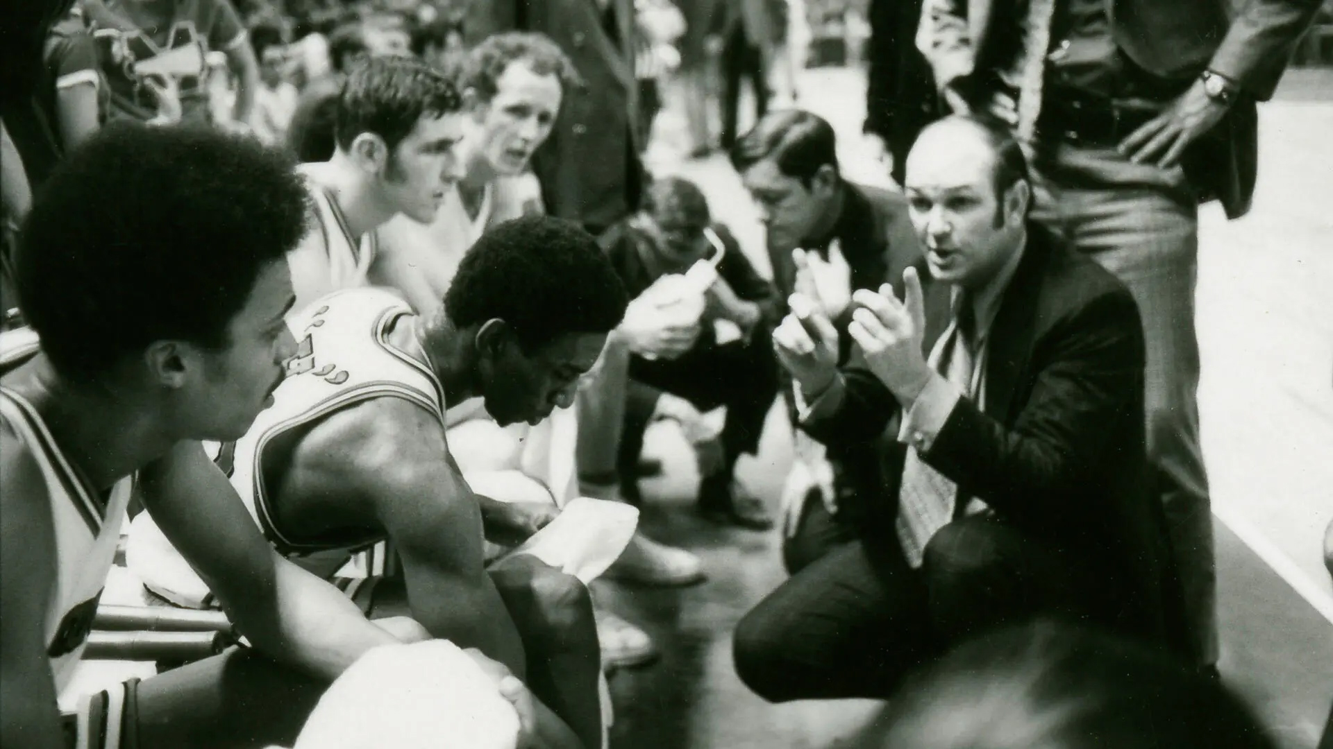 Charles "Lefty" Driesell huddles with players in a January 1971 game against South Carolina. Driesell racked up a 348-159 record with the Terps, and his 786 career victories still rank 15th all-time among all NCAA Division I coaches. Photo courtesy of University Archives.