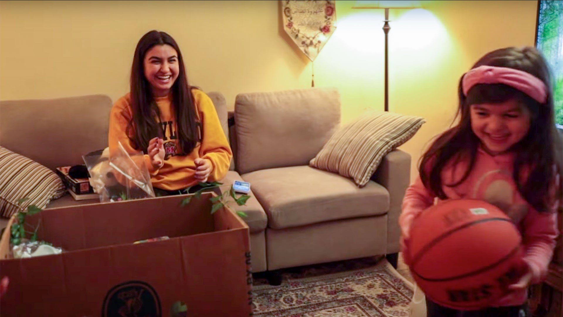  Sahar Afnan '24, a psychology and biological sciences major, visits a local refugee family as part of Peer to Peer's tutoring program. Since 2017, the organization has taught more than 300 students in Prince George's and Montgomery counties. Video and still by Peer to Peer.